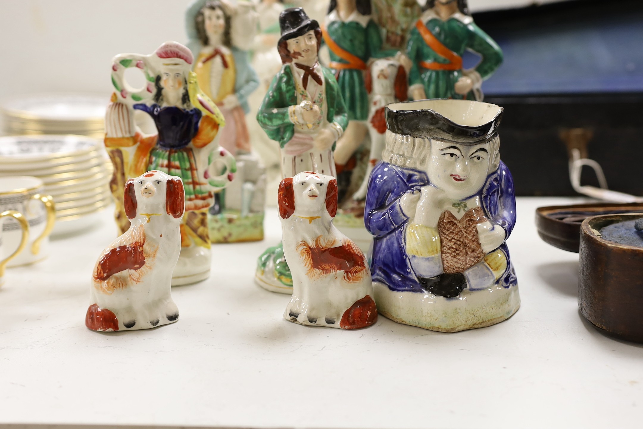 Eight Staffordshire figures and a Toby jug